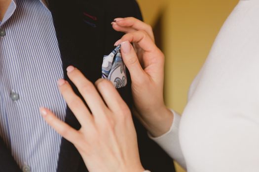 closeup shot of newlyweds hands. Wedding background