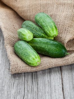 cucumbers on the wooden background