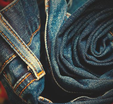 jeans constricted into a roll in the storefront