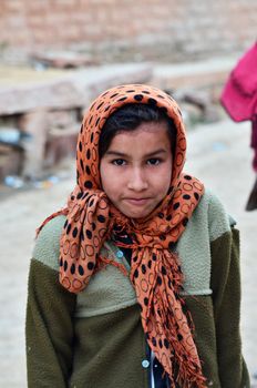 Jodhpur, India - January 2, 2015: Portrait of Indian girl in a village in Jodhpur, india. Jodhpur is the second largest city in the Indian state of Rajasthan with over 1 million habitants.