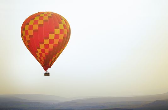 Air balloon flying in the sky. Horizontal photo