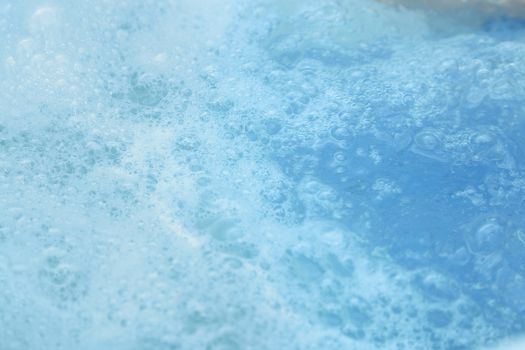 Close-up view on soapsuds in bathroom