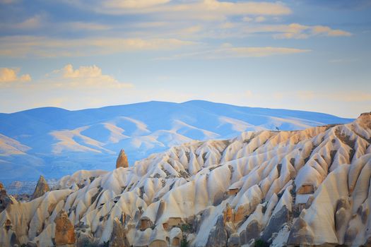 Rock formation of Cappadocia with ruined ancient houses