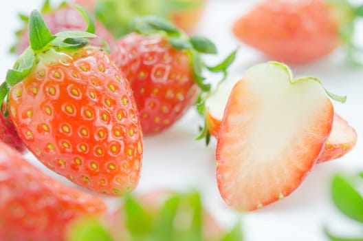close up of fresh strawberries , red fruits