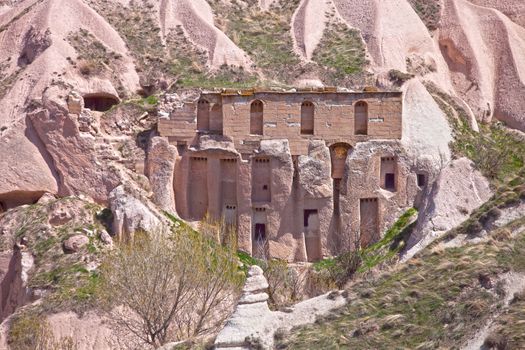 Home built into the soft rock cliffs of Cappadocia Turkey