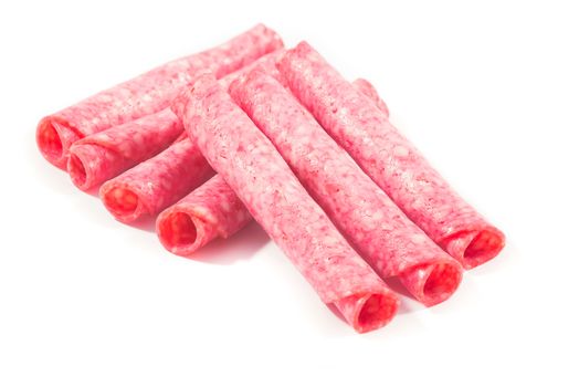 Picture of several salami slices formed as rolls