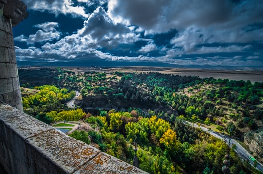 Dark sun and country side in Segovia, Spain as seen from high atop the Alcazar castle.