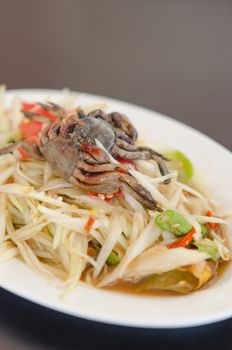 spicy papaya salad with crab on dish , asian spicy food