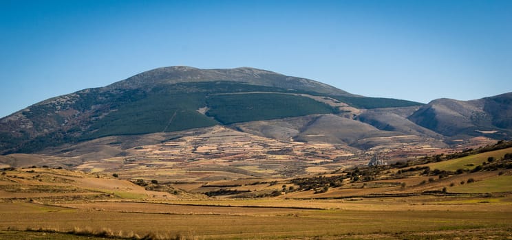 Cultivated fields at the foot of the slope.