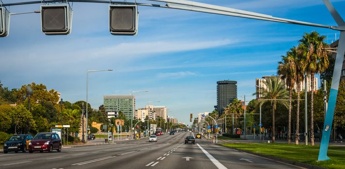 The driver's view of going into the city of Barcelona.