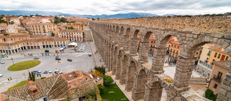 Segovia aqueduct on an overcast day in Spain.