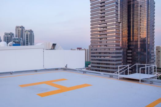 helipad for helicopter on roof top building for people transportation