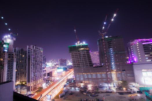 Abstract background of building construction site and crane, shallow depth of focus