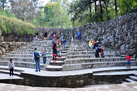 Chandigarh, India - January 4, 2015: People visit Rock statues at the rock garden on January 4, 2015 in Chandigarh, India. The rock garden was founded by artist Nek Chand in 1957 and is made completely of recycled waste.