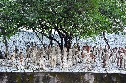 Chandigarh, India - January 4, 2015: Rock statues at the rock garden on January 4, 2015 in Chandigarh, India. The rock garden was founded by artist Nek Chand in 1957 and is made completely of recycled waste.