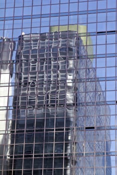 Modern building with glass facade in blue