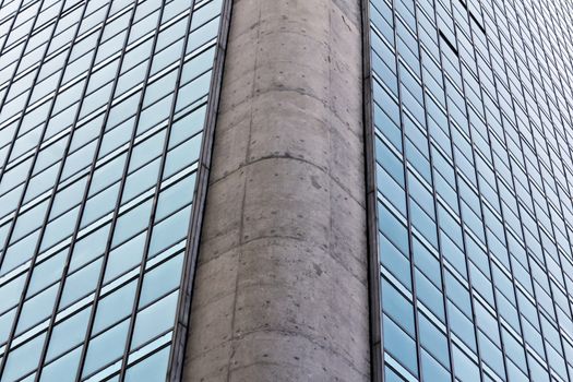 Modern building with glass facade in blue