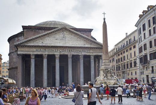 ROME, ITALY - SEPTEMBER 22, 2014: Tourists in front of the Pantheon temple.