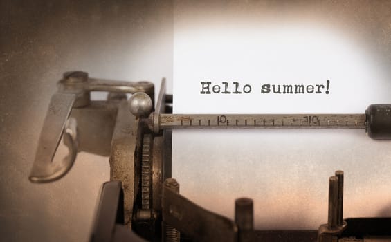 Vintage inscription made by old typewriter, Hello summer