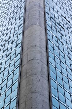 Modern building with glass facade in blue