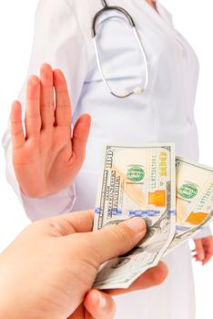 man's hand holds out bribe to doctor