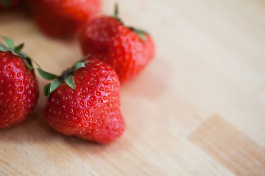 Fresh strawberries  at wooden background
