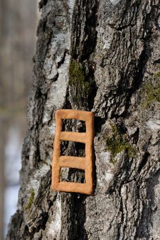 Lestvitsa, Russian rye festive spring cookie on tree vertical