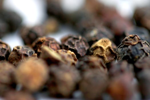 Close up of black pepper with a shallow DOF.