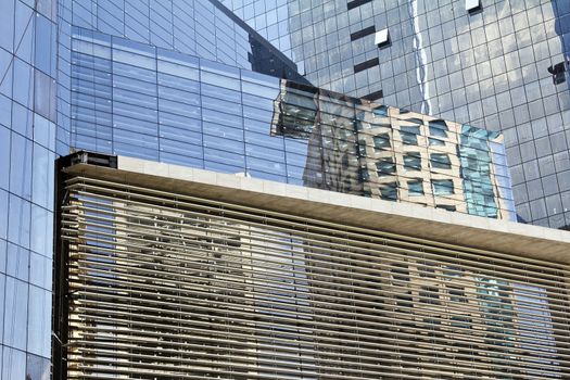 Modern building with glass facade in blue