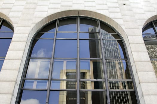 Modern building with glass facade in blue