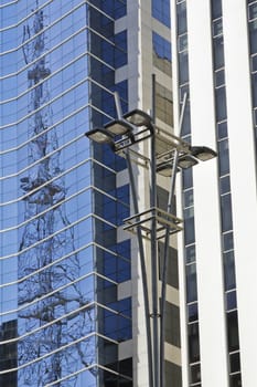 Modern building with glass facade in blue