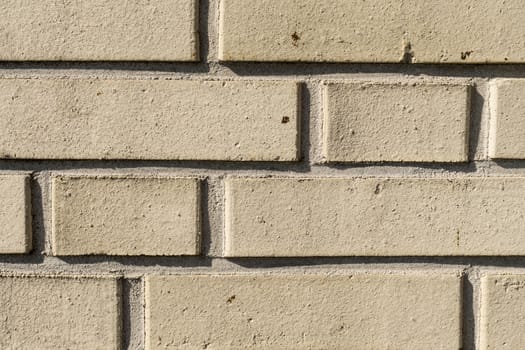 Closeup of a light color brick wall