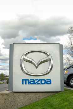 SANTA CLARITA, CA/USA - MARCH 1, 2015: Mazda automobile dealership and sign. Mazda Motor Corporation is a Japanese automaker.