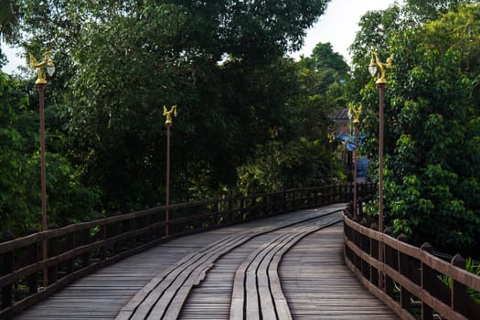 The old wooden bridge across the river