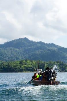 Lake mountain with boat and blue sky