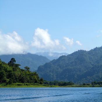 Lake mountain with clouds and blue sky