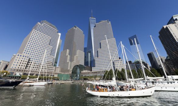 New York, USA-September 27, 2014:Tall ships docked at the North Cove Marina at Battery Park in Manhattan and financial center panorama