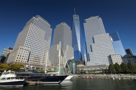 New York, USA-September 27, 2014:Tall ships docked at the North Cove Marina at Battery Park in Manhattan and financial center panorama