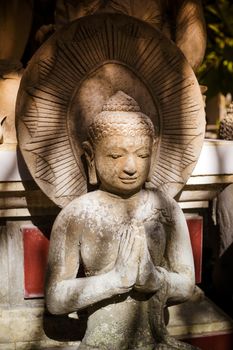 The old stone Buddha statue. Indonesia, Bali.
