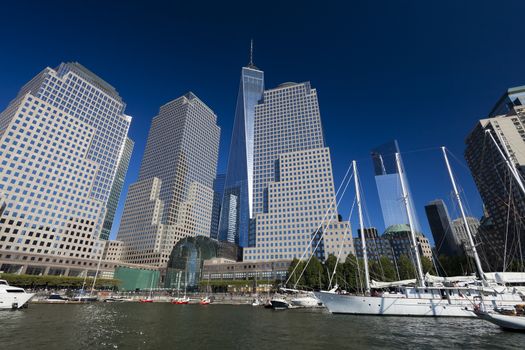 New York, USA-October 5, 2014:Tall ships docked at the North Cove Marina at Battery Park in Manhattan and financial center panorama