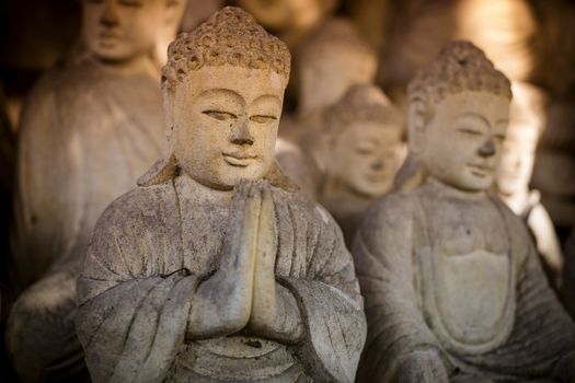 The old stone Buddha statue. Indonesia, Bali.
