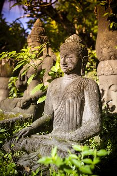 The old stone Buddha statue. Indonesia, Bali.
