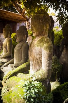 The old stone Buddha statue. Indonesia, Bali.
