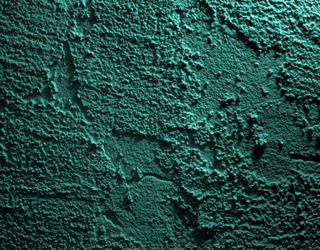 Dark Blue Green Cracked Cement Wall Background closeup with Shadows
