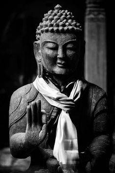 Wooden Buddha statue in black and white, kathmandu, Nepal