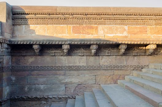 Crafted designs on rocks Adalaj Stepwell in Ahmedabad, Gujarat, India