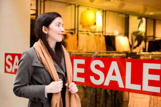 young woman window shopping