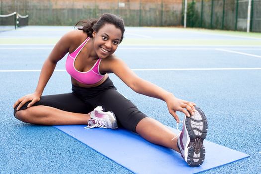 young woman stretching