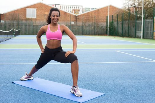 young woman stretching