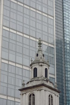 Church with modern  Office block in background